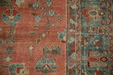 Evenly worn pile of a Bibikabad carpet showing ruby red and dusty teal floral bouquets.