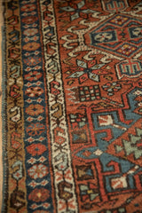 Vintage Karaja runner close-up; brick red, sky blue, and ivory geometric border with intact selvage.