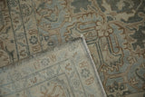 The hand-knotted foundation and tidy selvage of a vintage Tabriz carpet corner.