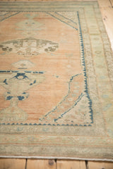 Detail of the stepped corner spandrel and nuanced relief on a vintage Hamadan rug.