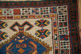 Reciprocating palm and geometric motifs in the unique wrapping borders of a vintage Persian Serab runner.
