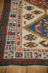 Vintage Persian Serab runner's intricate borders with reciprocating palm and geometric motifs.