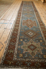 Vintage Karaja runner's long profile highlighting its geometric design and dusty teal field.