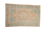 Vintage distressed Hamadan rug with a hexagonal medallion in dusty sky blue and pale coffee brown.