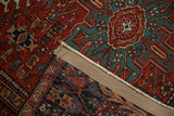 Secured side cord selvage and hand-knotted foundation of a vintage Persian Karaja rug.