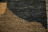 Close-up view of the densely ornamented checkered design in beige and cobalt blue tones.