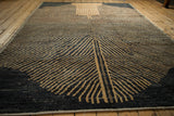 Angled view showing the sheen and plush texture of the abstract linear patterned Afghani carpet.