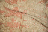 Detailed texture of a vintage distressed Oushak showing the hand-knotted pile and foundation.