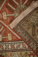 Hand-knotted construction and secure side cord binding on an antique Caucasian runner.