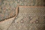 The hand-knotted back and sewn-on selvage of a distressed vintage Sivas carpet.