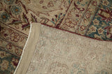 Hand-knotted foundation and restored side cord of a distressed vintage Persian Kerman carpet.