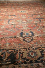 Textured low pile and bold Samovar turtle border on an antique Persian Heriz carpet.