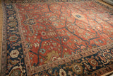 View of the rare serpent and Samovar turtle motif borders on a circa 1910s Persian Heriz carpet.