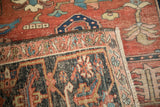 Corner detail of an antique Persian Heriz revealing the hand-knotted weave, foundation, and secured selvage.