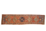 Antique Northwest Persian runner, brick red field, interconnected geometric medallions, pomegranate border, 2'9