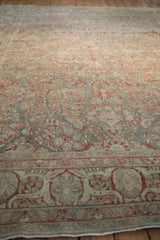 Traditional distressed Sarouk rug border with slate blue, pomegranate red palmette arabesque.