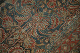 Worn pile texture of a vintage Hamadan rug showing Herati motifs and knot heads.
