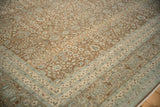 Distressed Hereke rug corner. Vine floral field, arabesque and roundel patterned border.