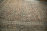 Pale coffee brown distressed Hereke carpet features abrashed ground, thousand flower design, white knots.