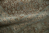 Distressed vintage Hereke carpet: pale powder blue arabesque border and floral field with white knots.