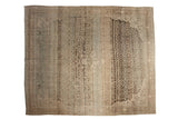 Vintage distressed Persian Bijar carpet with an allover Herati pattern and striking vertical abrashes.