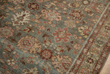 Textured low pile and floral cross-sections with decorative wear on a vintage Mahal rug runner.