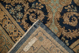 Corner of a vintage Kerman carpet showing its hand-knotted foundation and secured selvage.