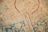 Hand-knotted foundation and machine-bound edge of a vintage distressed Ahar carpet.