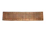 Vintage distressed Bijar runner with an allover boteh pattern in dusty teal, rust, and ivory.
