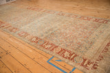 Angled view highlighting color abrashes across the Herati field of a vintage Bijar runner.