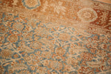 Texture of mostly even wear on the Herati design's sky blue and sandalwood tones.