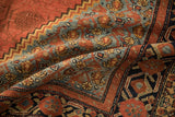 The rich texture and meandering vine motifs of a late 19th-century Persian Malayer carpet.