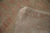 Back of an antique Malayer rug runner showing its hand-knotted foundation and side selvage.