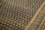 Antique Persian Tabriz carpet field with diagonal boteh, checkered vine, and pawn motif.