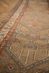 Low pile texture and visible knot heads on an antique Persian Camel Hair Serab runner.