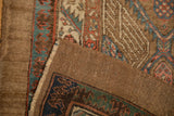 Corner of antique Serab runner showing hand-knotted camel hair pile and tightly woven foundation.