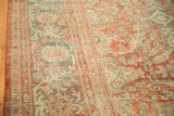 Softened texture of vintage distressed Mahal carpet, with pale brick red and dusty teal patterns.