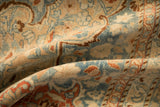 Texture of a distressed vintage Tabriz with even wear to the knots in dusty blue and sand.