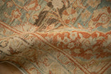 Detail of a vintage Mahal rug's soft, pliable texture and evenly worn, low pile.