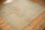Time-softened tones and low-pile texture on a distressed vintage Afshar rug.