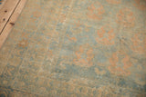 Low, evenly worn pile and intact side cord selvage of a vintage distressed Afshar rug.