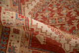 Close-up of a vintage Serab runner's hand-knotted texture and geometric pawn design.