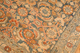 Intricate Herati motifs and floral border details on a distressed Malayer runner with a low, even pile.