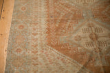 Visible knot heads and foundation show the worn texture of a distressed Afshar rug's geometric patterns.
