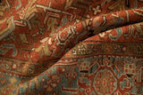 Hand-knotted pile of a vintage Heriz carpet with mostly even wear across the wool knot heads.