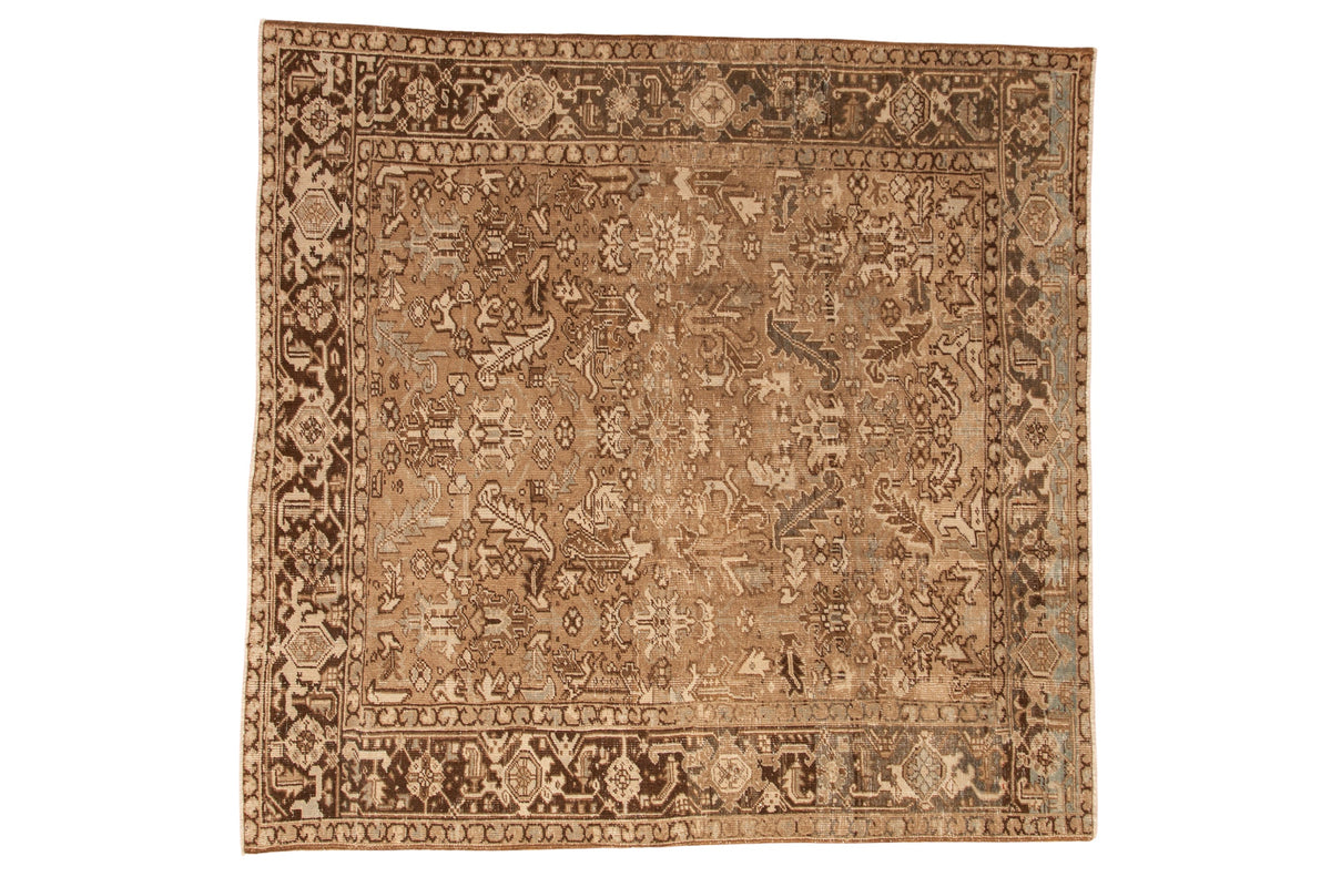 Vintage distressed Heriz square carpet with an allover geometric design in beige, chocolate brown, and powder blue.