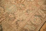 Detail of the hand-knotted Bakhtiari carpet border with roundel and blossom motifs.