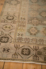 The time-softened texture of a fine Hamadan runner, showing its low pile and geometric guls.