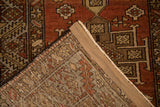 Hand-knotted back and restored side cord of a distressed vintage Heriz rug runner.