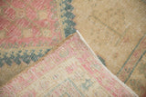Close-up showing the hand-knotted foundation and distressed pile of the vintage Serab runner.